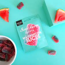 Vegan Friendly, Plastic Free Watermelon Sweets. Fizzy, natural flavours, gluten-free, fat free, compostable packaging. Buy at Out of the Box Gifts